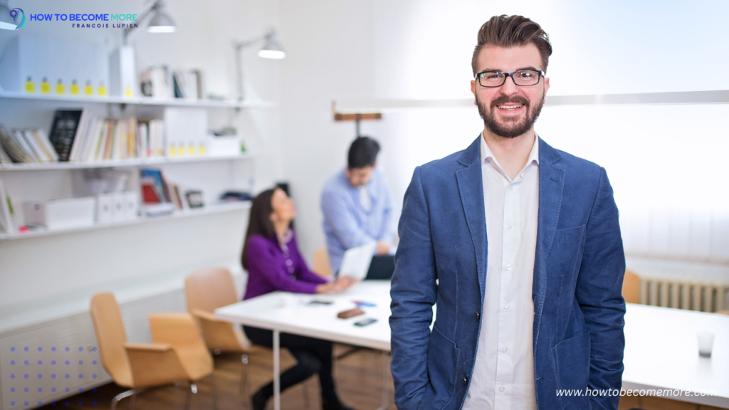 Young handsome Successful man at
his office, looking at camera